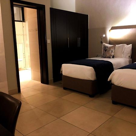 Mythos Boutique Hotel Kigali Chambre photo